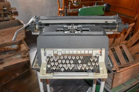 Old retro writer machine in the storage room Stock Photos