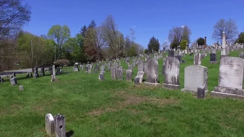 Old Revolutionary War Era Church Cemetery Headstones closeup flyover Stock Footage