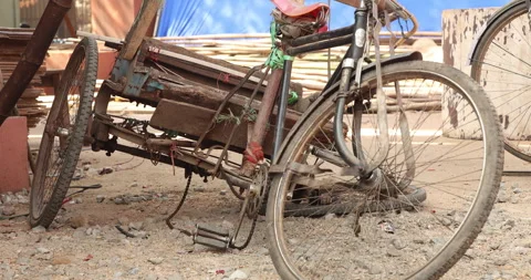 Old Rickshaw parking on the road Stock Footage 324037045
