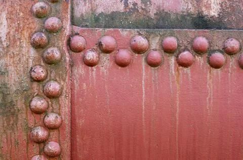 Old riveted metal wall surface Stock Photos