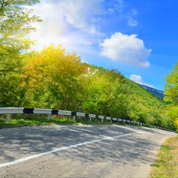 Old road in mountains Stock Photos