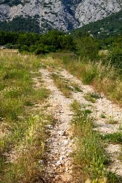 Old road in mountains Stock Photos