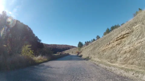 Old road through hilly terrain, video with GoPro Stock Footage 56738786