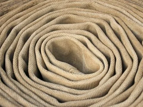 Old rolled fire hose Stock Photos