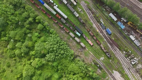 Old rolling stock at Lydney junction railway siding UK aerial Stock Footage 294922596
