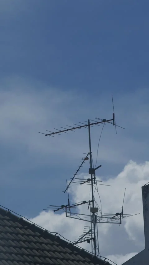Old rooftop television antenna with multiple elements Stock Footage 335584010