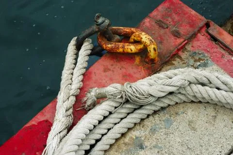 Old ropes on the dock. close up Stock Photos