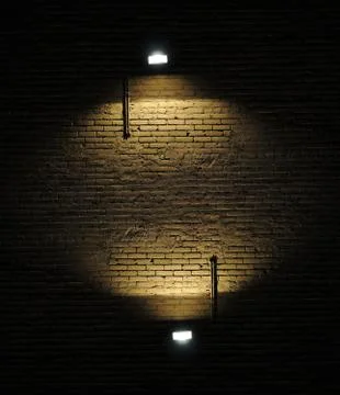 Old rough brick wall background texture with a spotlights shining on it Stock Photos