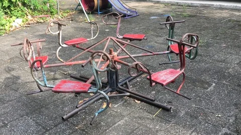 The old roundabout spinning round  Stockbeeldmateriaal 89936935