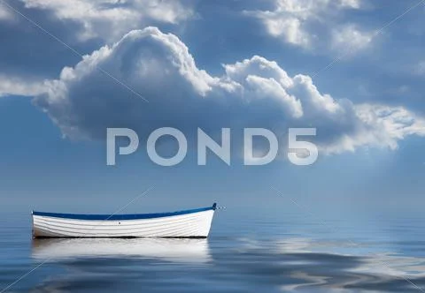 Old rowing boat marooned at sea Stock Photos