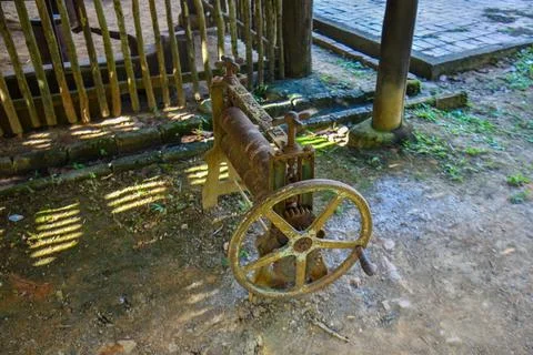 Old rubber sheet roller machine. Stock Photos