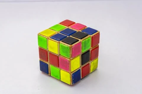 Old Rubik`s Cube isolated on white background Stock Photos