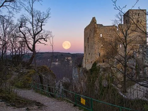 Old ruin with fullmoon in the background Stock Photos