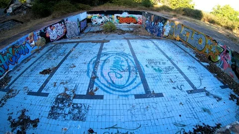 AN OLD RUINED SWIMMING POOL Stock Footage 94449534
