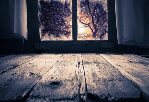 Old rural interior window table overlooking winter evening Stock Photos