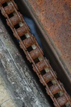 Old rust bicycle chain, top view, close-up. Stock Photos