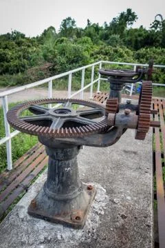 Old rust gear of sluice Stock Photos