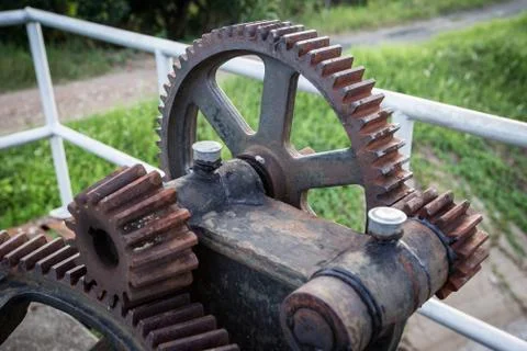 Old rust gear of sluice Stock Photos