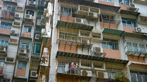 Old, Rust Streaked Facade of an Apartment Building in Asia Stock Footage 54609333