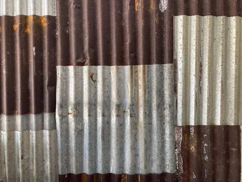 Old rust zinc sheets in brown and silver color Stock Photos