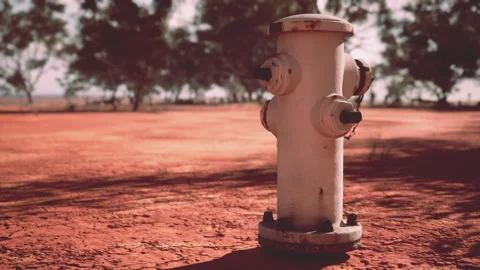 Old rusted fire hydrant in desert Video stock 239412536