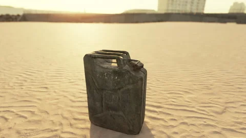 Old rusted fuel can on the beach Stock Footage 239407516