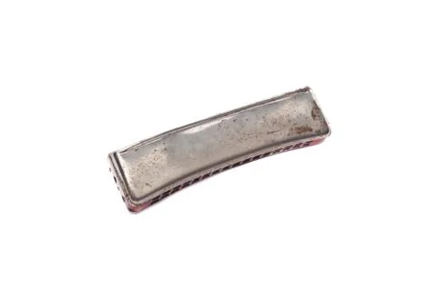 Old rusted harmonica isolated on white background Stock Photos
