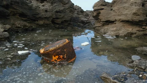Old rusted metal and polystyrene debris discarded on sea ecosystem,pollution Stock Footage 189966893