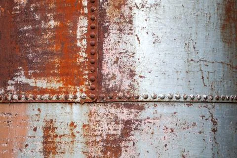 Old rusted metal background texture with rivets Stock Photos