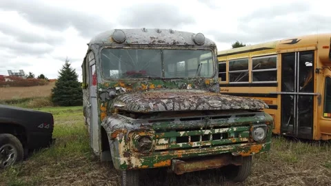 Old rusted school bur tracking shot 4K Stock Footage 142396560