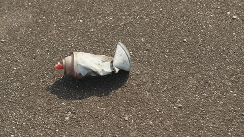 Old rusted Spray Can bent and broken on asphalt, 4k 動画素材 111932696