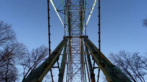 Old rustic abandoned Ferris wheel Stock Footage 152138172