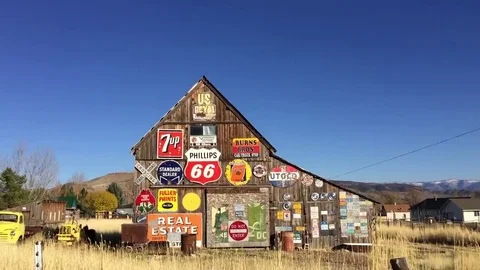 Old rustic barn with antique signs HD Stock-Footage 69182957