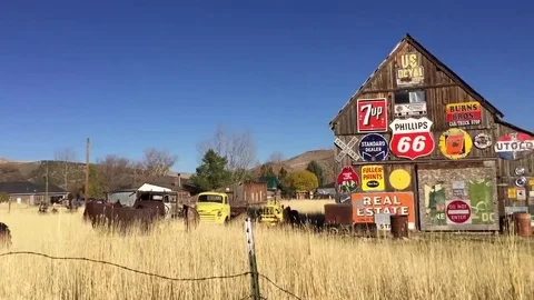 Old rustic barn with antique signs, panning HD Stock-Footage 69182983