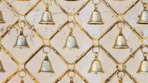 Old Rustic Bells. Iron Decorative Hanging Bells with tarnished brass finish Foto stock