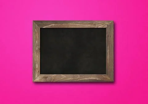 Old rustic black board isolated on a pink background Stock Photos