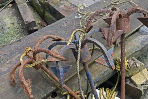 Old rustic boat anchor Photos