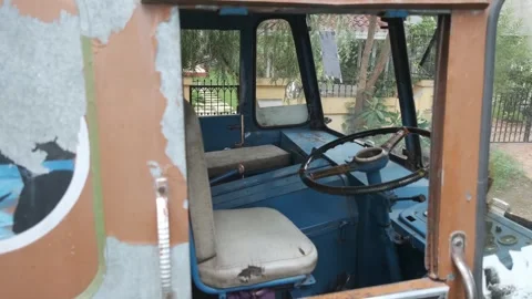 Old rustic bus driver cabin interior of vintage abandoned vehicle. Stock Footage 337621884