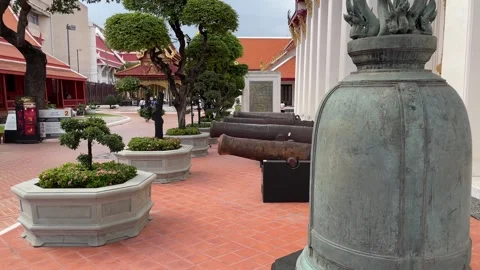 Old rustic cannon and bell on displaying at Thailand's national theatre Video stock 251848003