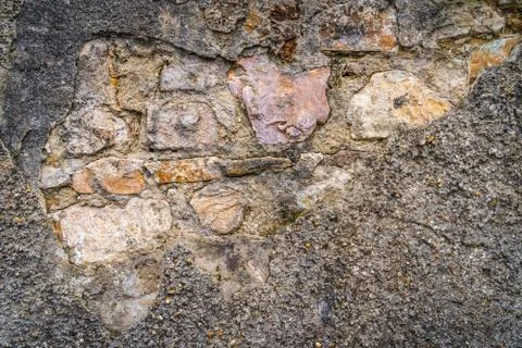 Old, rustic corroded and damaged brick wall Stock Photos