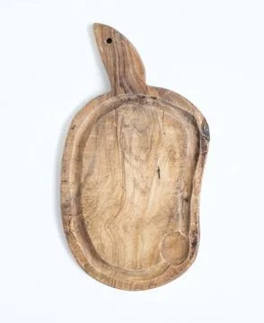 Old rustic cutting board made of olive wood on a white backgroun Stock Photos