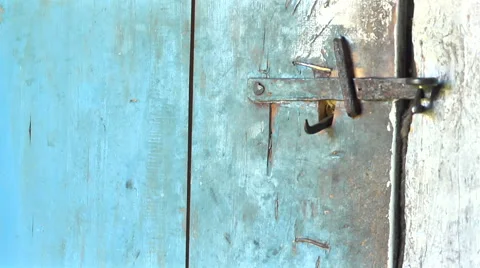An old rustic door with  a black  background Stock-Footage 55049098