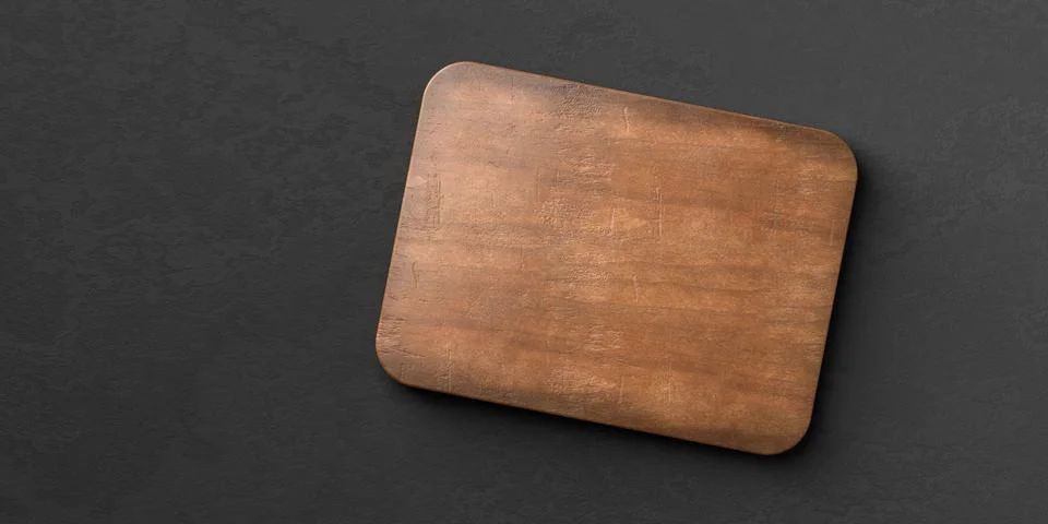 Old rustic empty wooden cutting or chopping board on black stone background.. Stock Illustration