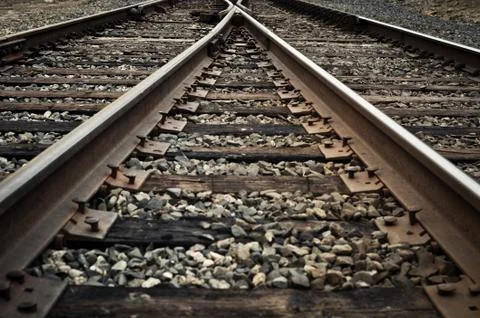 Old rustic railroad track splitting lanes Foto stock