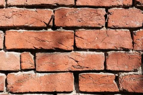 Old, rustic red brick wall. Background, texture, pattern Foto stock
