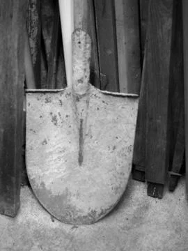 OLD RUSTIC SHOVEL ON THE GROUND Stock Photos