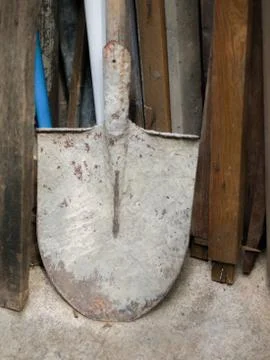 OLD RUSTIC SHOVEL ON THE GROUND Stock Photos
