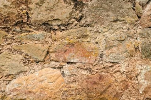 Old Rustic Stone wall Background Stock Photos