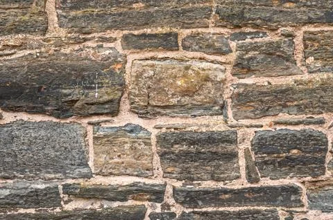 Old Rustic Stone wall Background Stock Photos