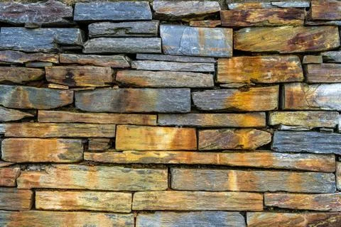 Old rustic stone wall High quality texture and background Stock Photos
